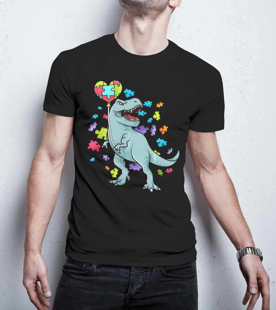 Autism Awareness Dinosaur With Puzzle Heart Balloon And Colorful Puzzle Pieces T-Shirt