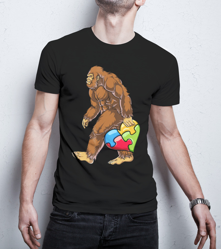 Bigfoot Holding Puzzle Piece Heart Autism Awareness T-Shirt