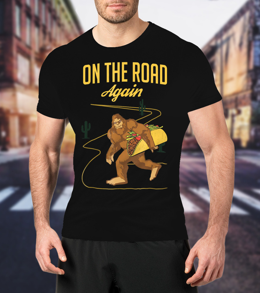 ON THE ROAD AGAIN Smirk Bigfoot Sasquatch Carrying Taco T-Shirt
