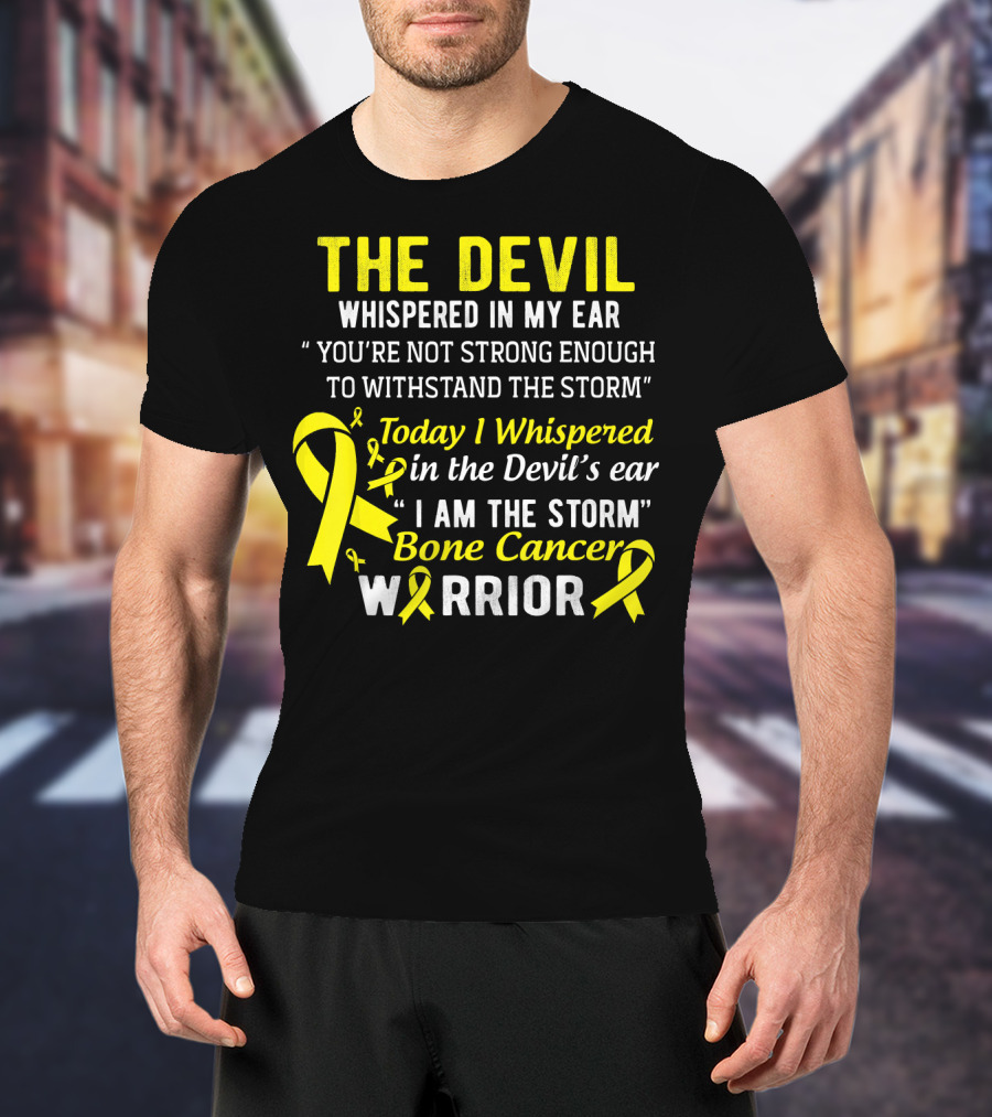 The Devil Whispered You’re Not Strong Enough To Withstand The Storm I Am The Storm Bone Cancer Warrior Yellow T-Shirt