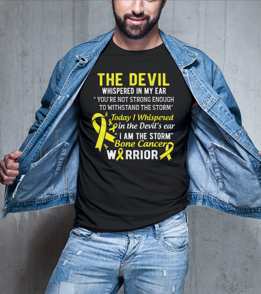 The Devil Whispered You’re Not Strong Enough To Withstand The Storm I Am The Storm Bone Cancer Warrior Yellow T-Shirt