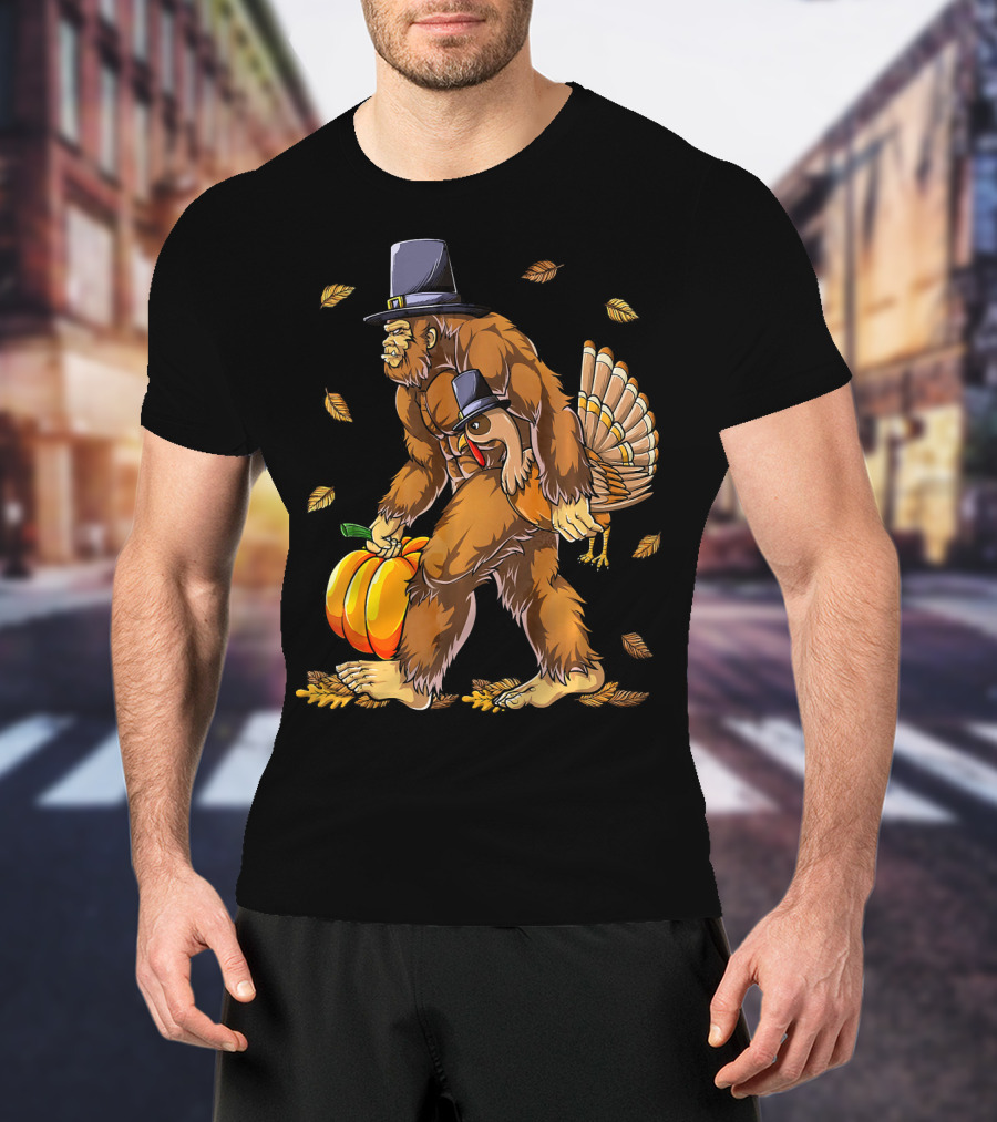 Bigfoot Pilgrim Turkey Carrying Pumpkin Thanksgiving T-Shirt