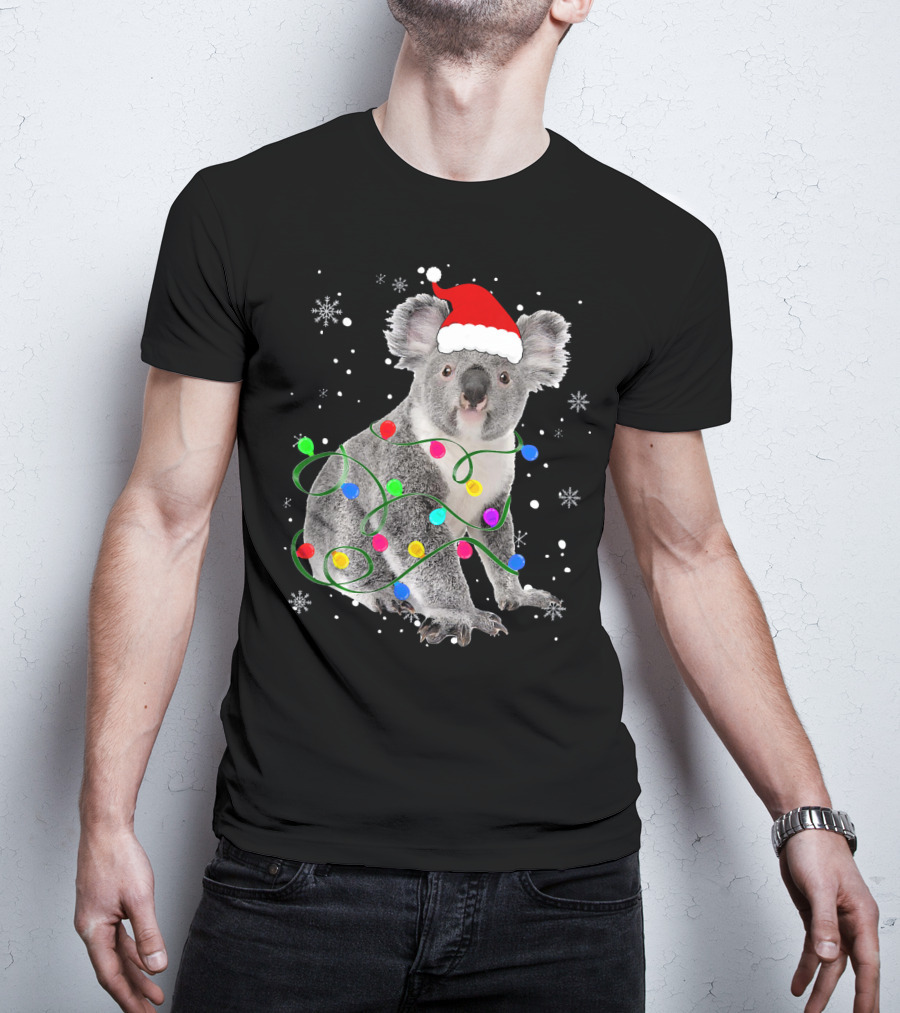 Koala Wrapped In Christmas Lights Wearing Santa Hat With Snowflakes Matching Fam T-Shirt