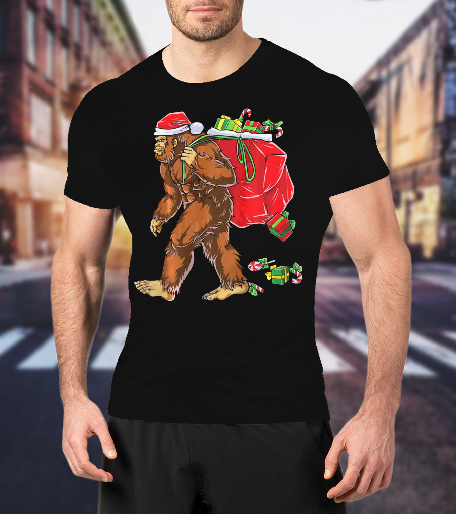 Bigfoot Santa Carrying Gifts With Candy Canes T-Shirt