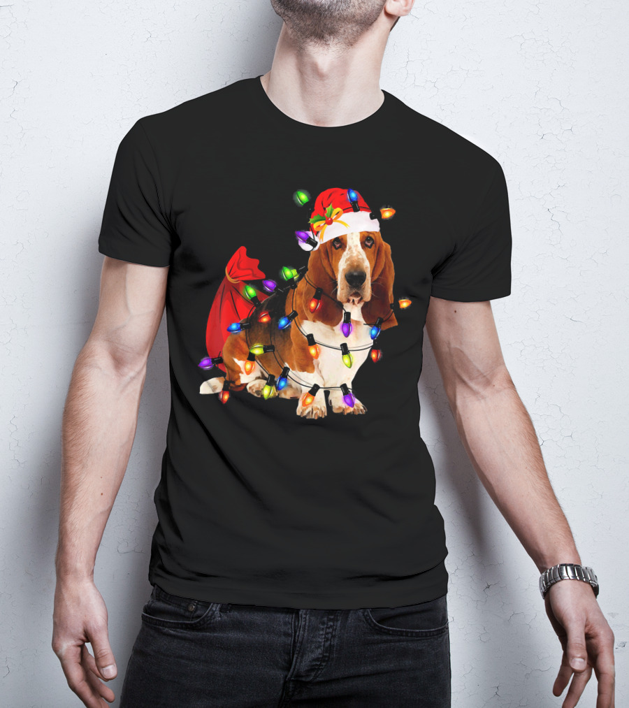 Basset Hound Wrapped In Christmas Lights With Santa Hat And Red Sack T-Shirt
