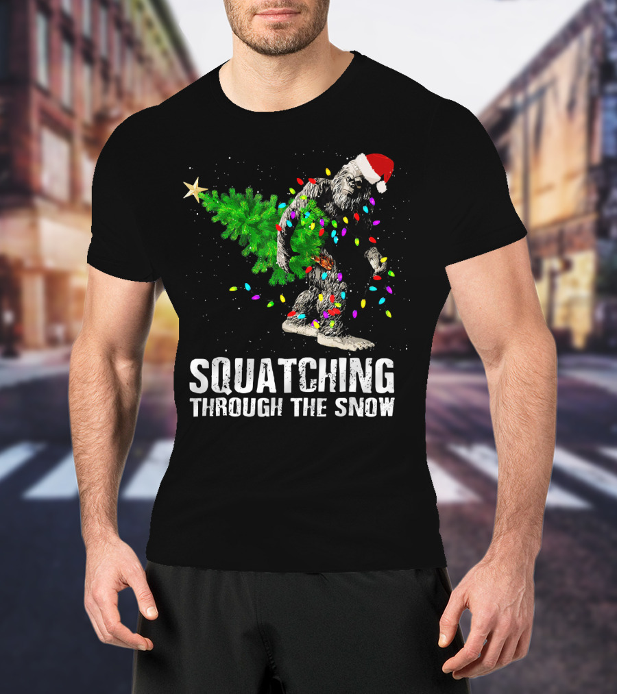 Squatching Through The Snow Bigfoot Christmas Lights Santa Hat T-Shirt