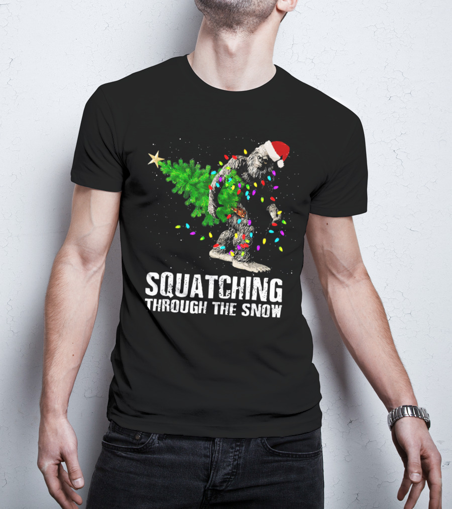 Squatching Through The Snow Bigfoot Christmas Lights Santa Hat T-Shirt