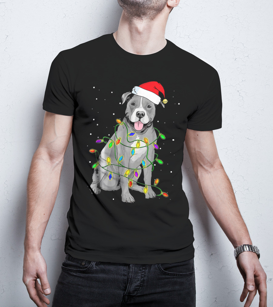 Pitbull In Santa Hat Wrapped In Christmas Lights With Snowy Background T-Shirt