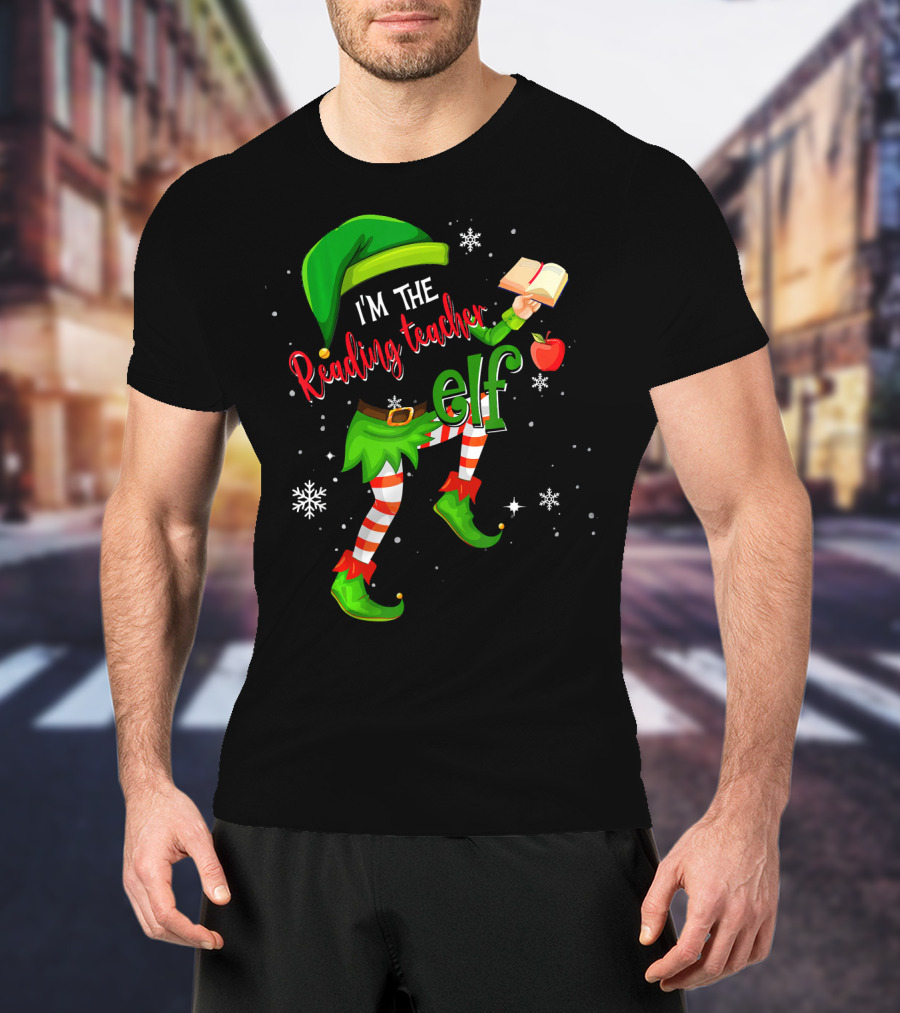I'm The Reading Teacher Elf Holding Book Apple Wearing Elf Outfit Snowflakes T-Shirt