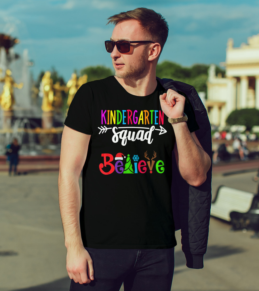 Kindergarten Squad Believe Christmas Text With Santa Hat Tree Snowflake And Reindeer Antlers T-Shirt