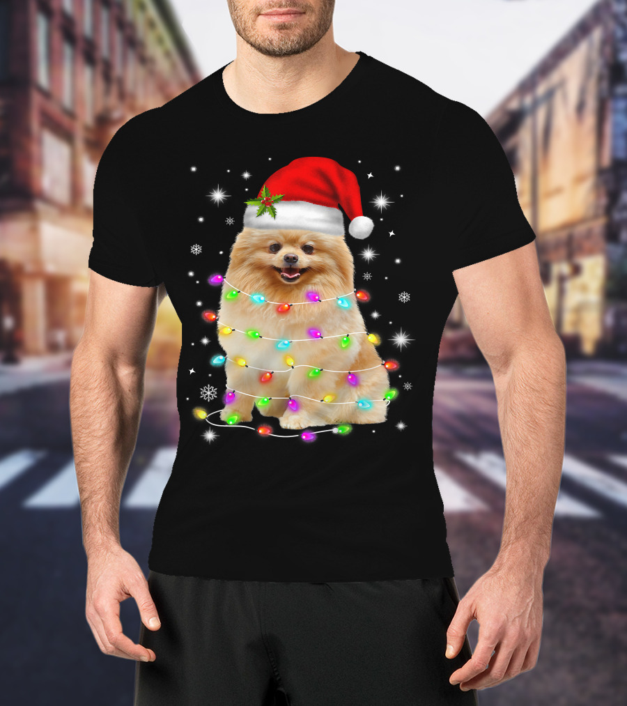 Pomeranian Pup Wrapped In Christmas Lights With Santa Hat And Festive Glow T-Shirt