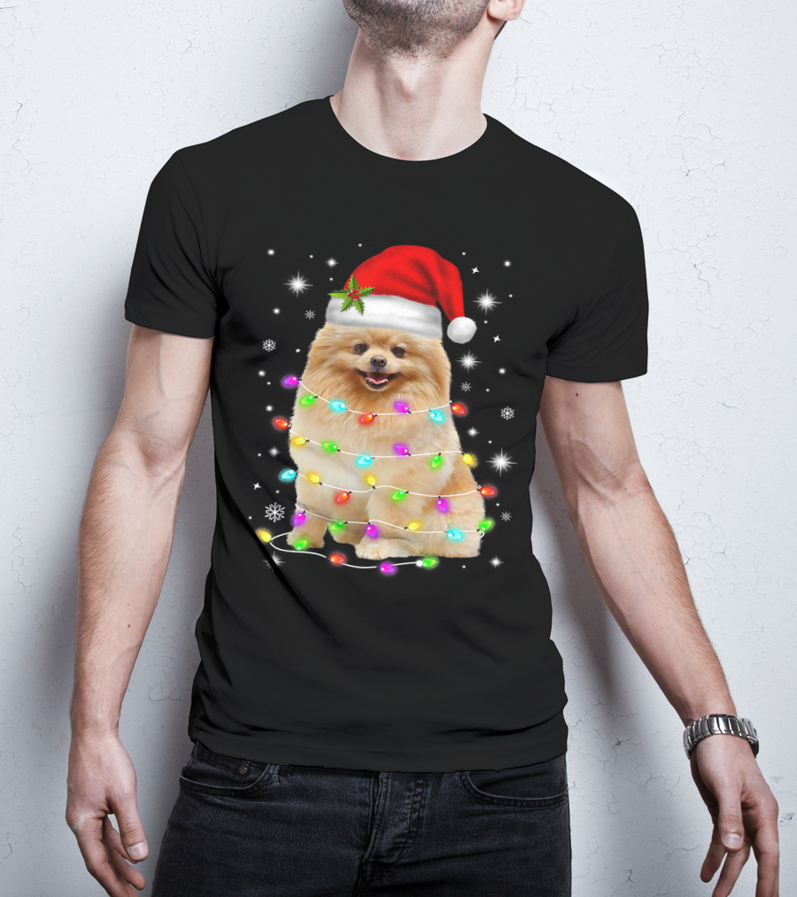 Pomeranian Pup Wrapped In Christmas Lights With Santa Hat And Festive Glow T-Shirt